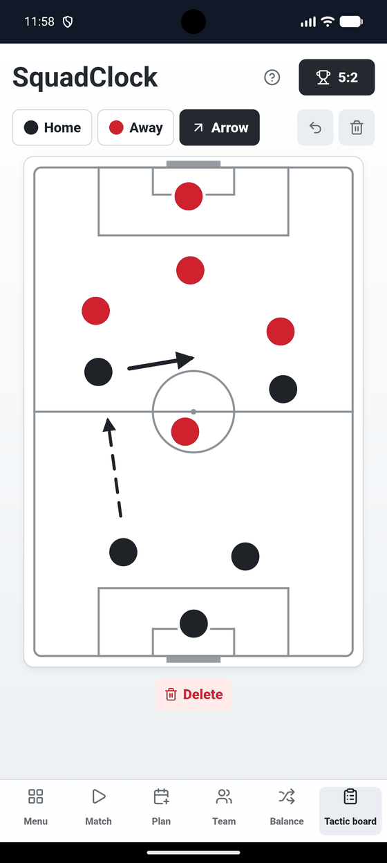 Tactics board with a pitch, players in two colours and runs drawn as arrows